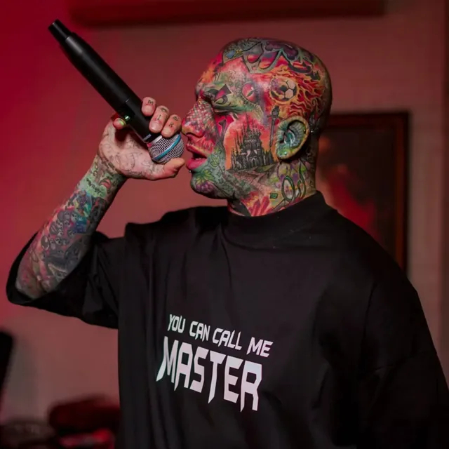 بیوگرافی امیر تتلو خواننده با عکس تتوها