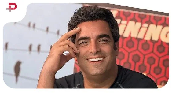 بازیگر مردم دوست سینما با عکسی جذاب؛ منوچهر هادی کنار نارنجی پوشان شهر!