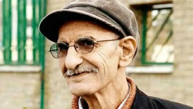 عکس| سفر به گذشته ؛ عکس نادر احمد پورمخبر کنار دستفروش تهران در سال 96!