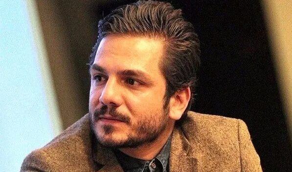 رونمایی از عکس خانوادگی عباس غزالی زیر سایه پرچم شیر و خورشید + عکس جنجالی - تصویر شاخص