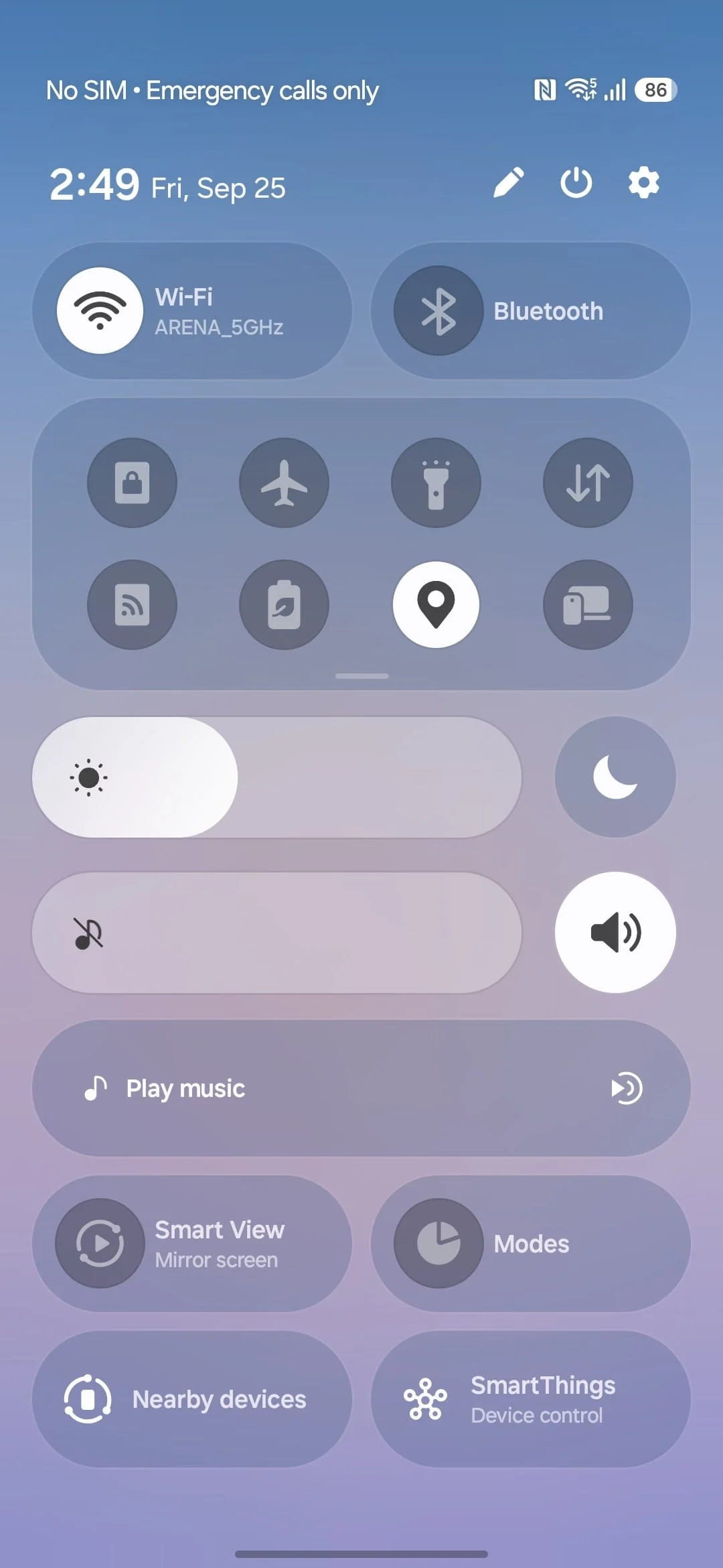 gsmarena_013-1 Control center with quick settings: Wi‑Fi, Bluetooth, airplane mode icons, and brightness/volume sliders visible at top and middle of screen.